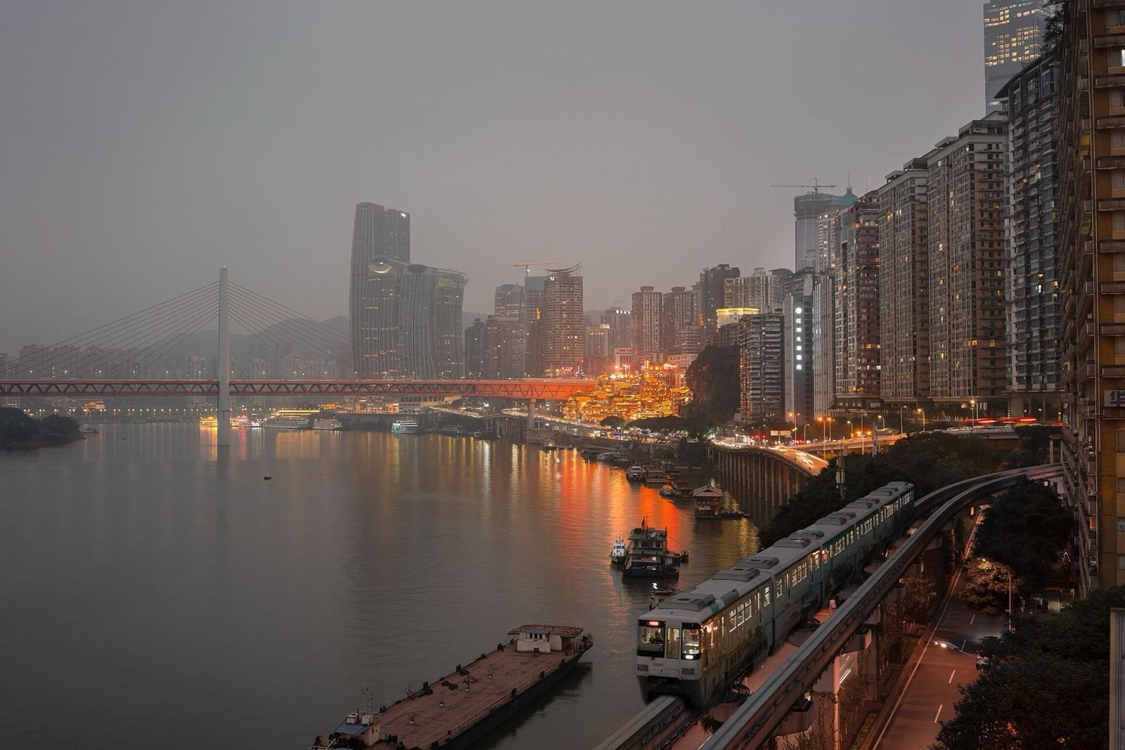 Chongqing, The vertical city: monorails through buildings, cliffside lanes, nine-grid hotpot