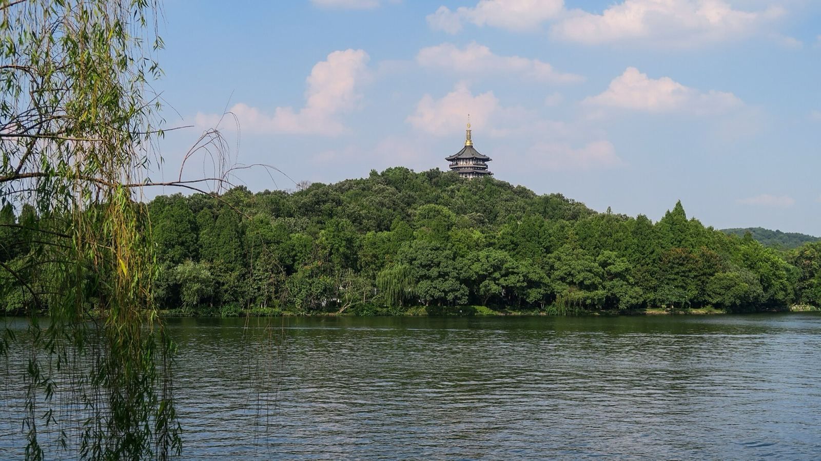 Hangzhou, West Lake causeways, Longjing tea villages, an hour from Shanghai